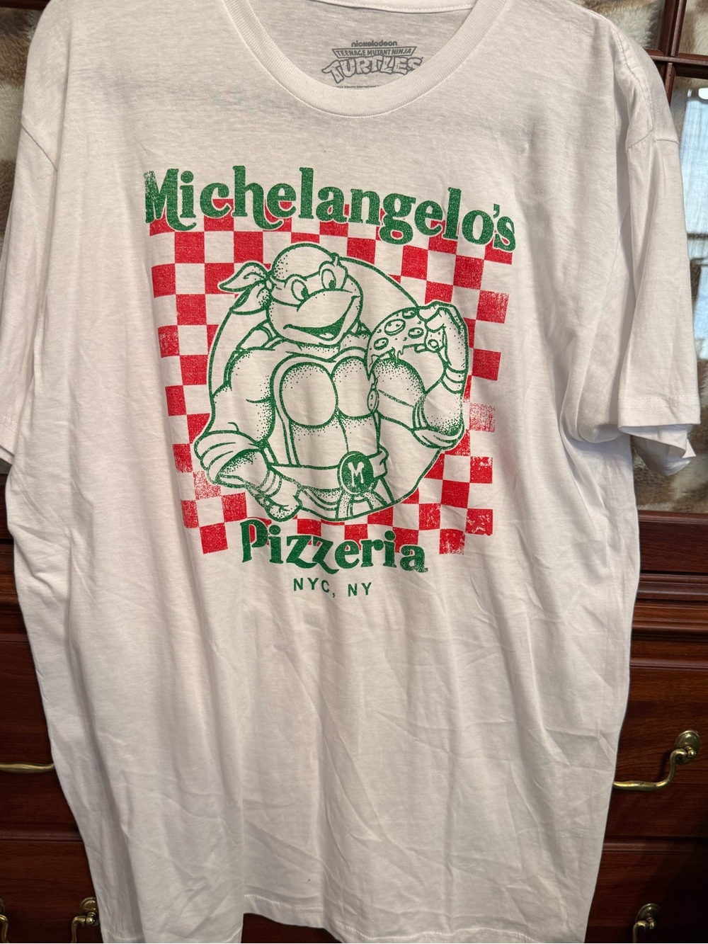 Nickelodeon White T‑Shirt with Red and Green Michelangelo Pizzeria Graphic